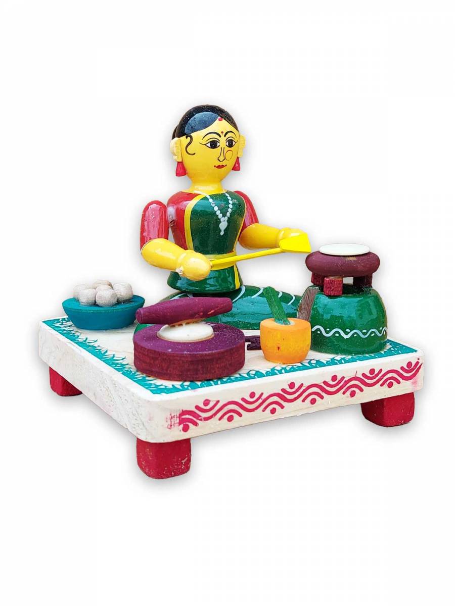 Wooden Village Lady Cooking Chapathi - Etikoppaka Dolls
